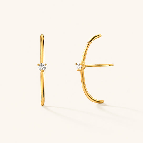 Les boucles d'oreilles Arc diamanté