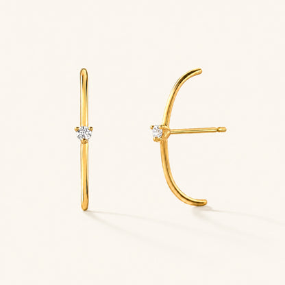 Les boucles d'oreilles Arc diamanté