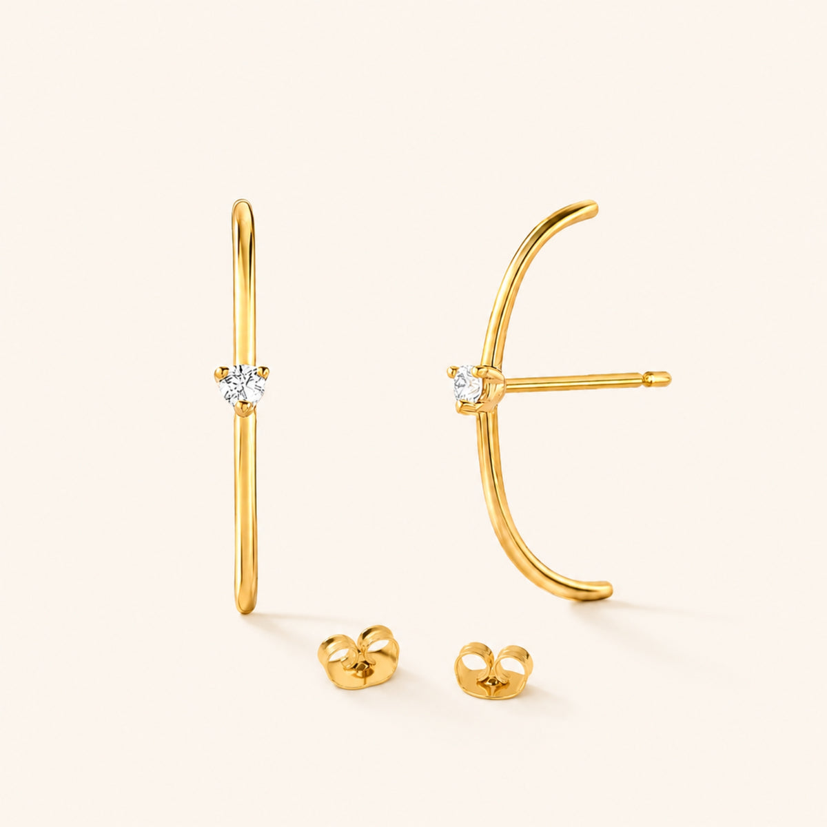 Les boucles d'oreilles Arc diamanté