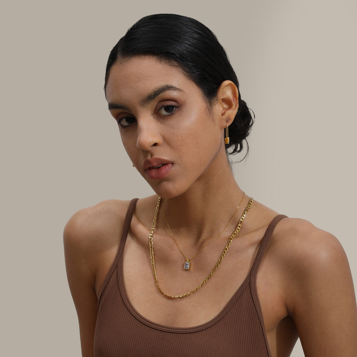 Les Boucles d’Oreilles Verrou