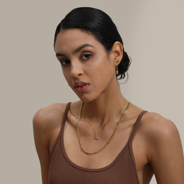 Les Boucles d’Oreilles Verrou
