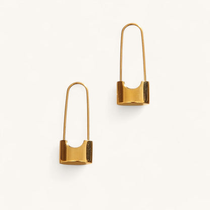 Les Boucles d’Oreilles Verrou