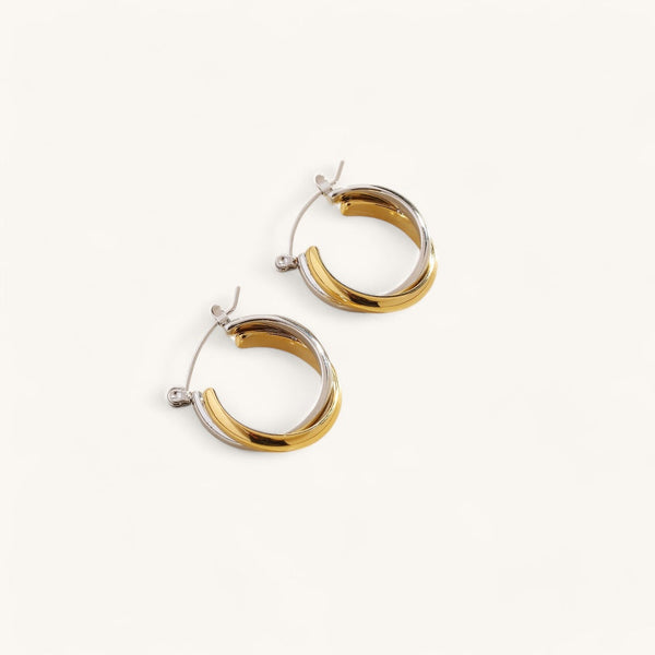 Les Boucles d’Oreilles Double Torsade