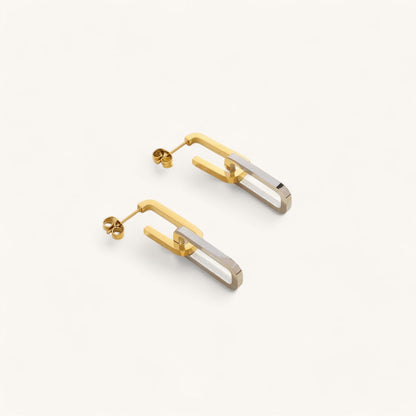 Les Boucles d’Oreilles Verrou Bicolore