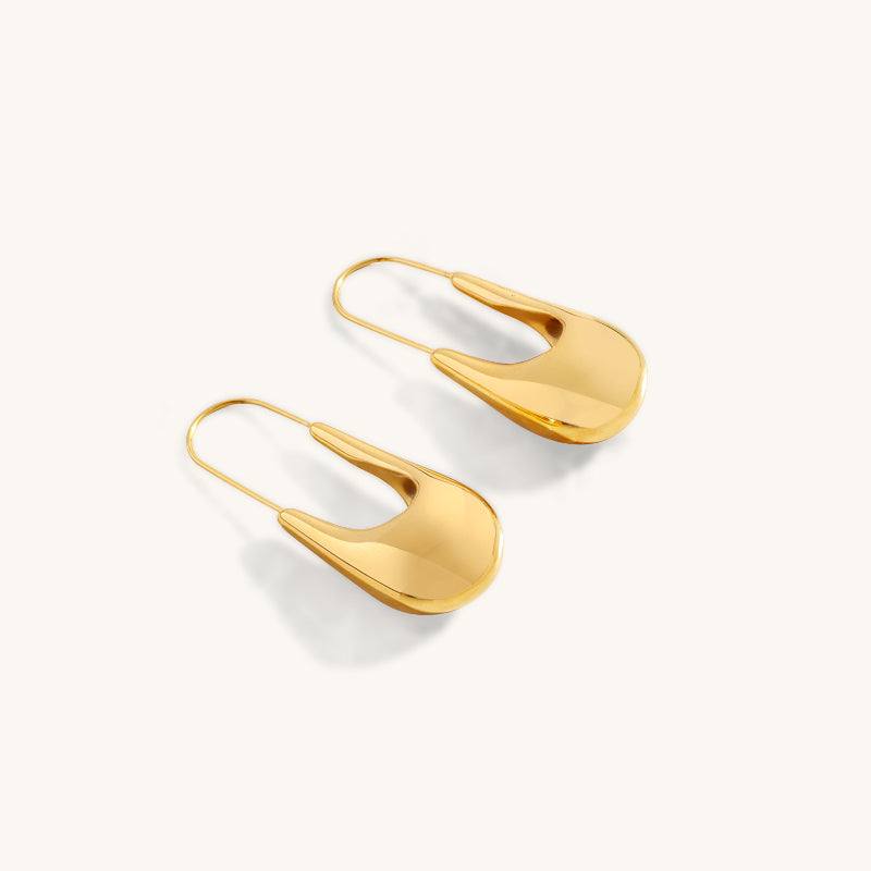 Les Boucles d’Oreilles Coulure