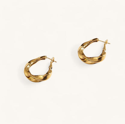 Les Boucles d’Oreilles Flora