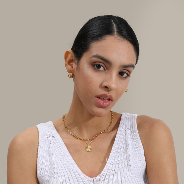 Les Boucles d’Oreilles Ève
