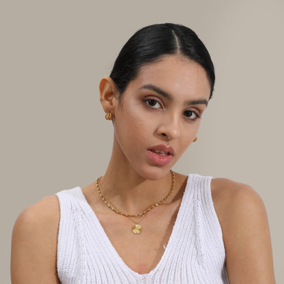 Les Boucles d’Oreilles Ève